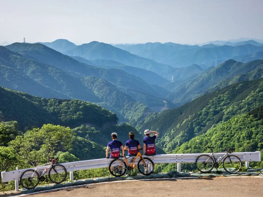 Two cyclists on a winding road